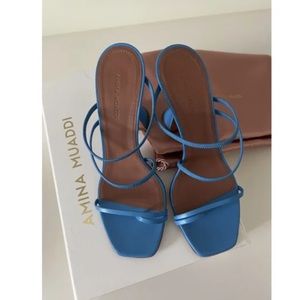 Amina Muaddi leather mules